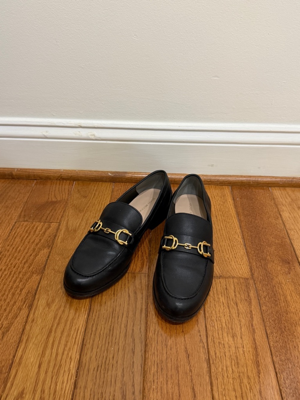 Stuart Weitzman Black Leather Loafers with Gold Horsebit Hardware